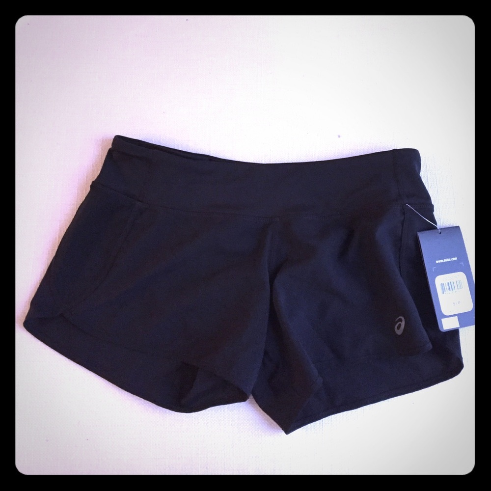 Size small asics running shorts. Never been worn!
